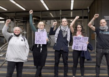 Met Police arrest peaceful Palestine activists under terrorism laws.
