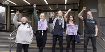 Met Police arrest peaceful Palestine activists under terrorism laws.